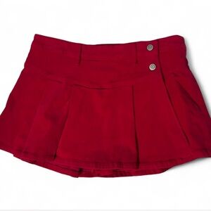 Copper Key red pleated mini skirt with button detail
